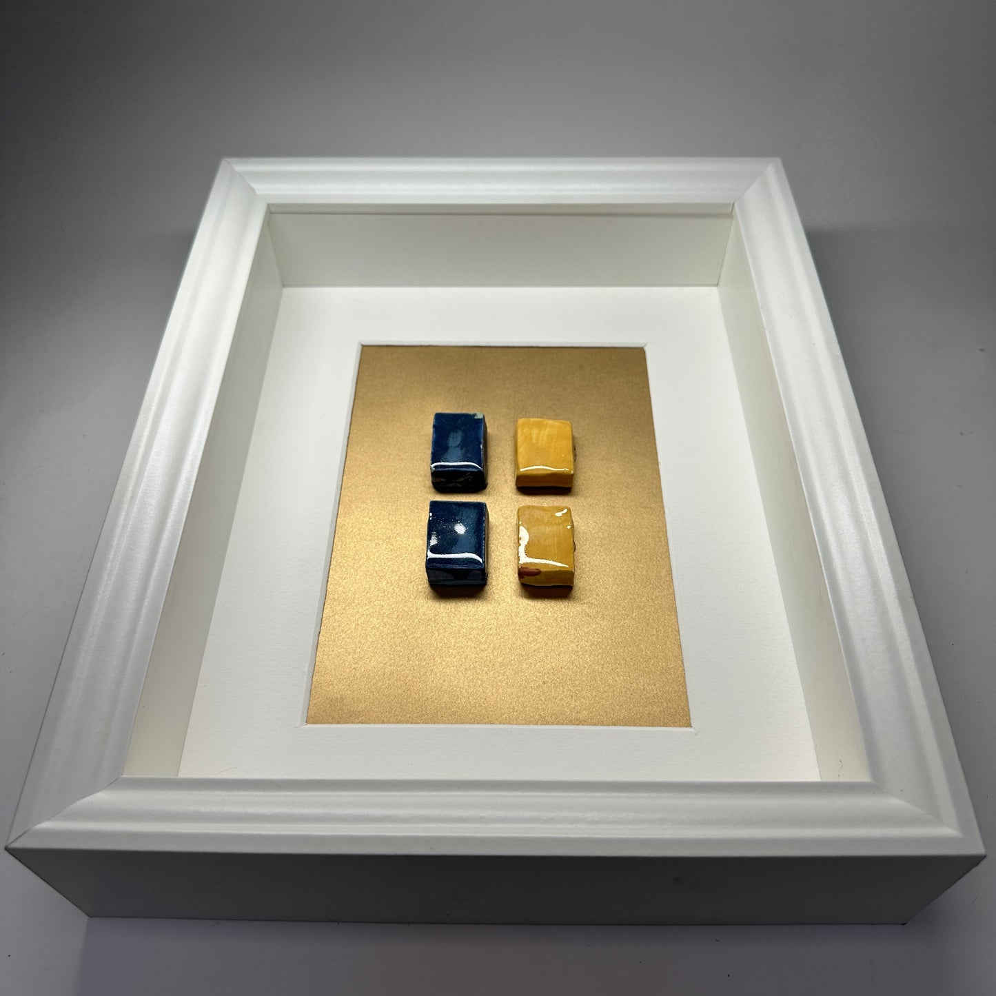 “A Proud Rossie” framed ceramic wall piece